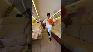 Dubai sheikh child play football on plane