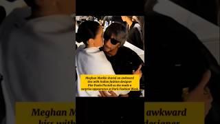 Meghan Markle shared an awkward kiss with Italian fashion designer at Paris Fashion Week #meghan