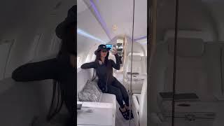 Millionaire girl enjoying in plane