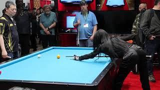 Jeanette Lee "The Black Widow" plays 3-cushion carom billiards.