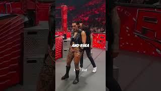 Nakamura give a kiss to Rhea